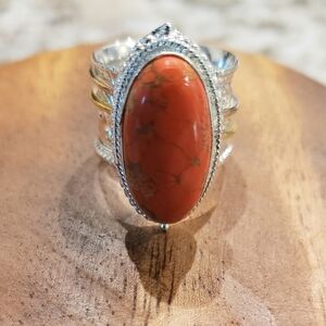 Turquoise 925 sterling silver spinner. Handmade. Orange color.